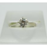 An 18ct white gold, diamond solitaire ring, 0.