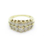 A 14ct gold and fourteen stone ring, 3.