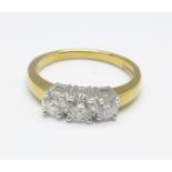 An 18ct yellow gold and three stone diamond ring, 3.9g, N, 0.
