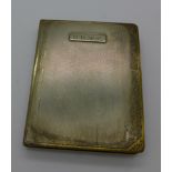 A silver case in the form of a book, bears initials, Birmingham 1929, 120g,