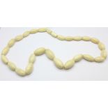 An ivory bead necklace