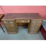 A Victorian mahogany breakfront kneehole desk