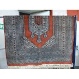 A red ground rug,