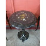 A Victorian painted black lacquered papier mache tripod table,