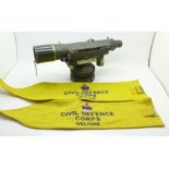 A military theodolite and two Civil Defence Corps armbands