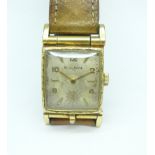 A Bulova gold plated travel wristwatch,
