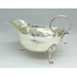 A silver sauce boat,