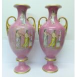 A pair of porcelain two handled vases, decorated with Romanesque scenes on a pink ground,