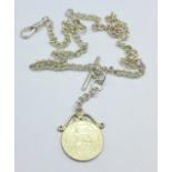 A silver Albert chain with a 1907 shilling coin fob,