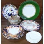 A collection of Royal Crown Derby plates and saucers