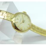 A lady's 9ct gold wristwatch, total weight with movement 21.