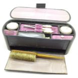 A travel vanity set, c.