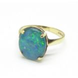 A 9ct gold and black doublet opal ring, 2g,