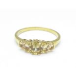 A 9ct gold and five stone citrine ring, 2.