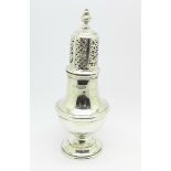 A silver sugar shaker,