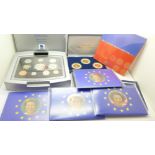 A Royal Mint Year 2000 coin set including a £5 coin and other coin sets