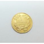 An American gold dollar coin, 1857, 1.