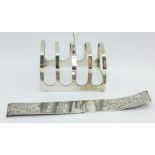 A silver toast rack and a scrap silver mount,