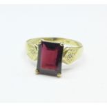 A 9ct gold, garnet and diamond ring, 1.