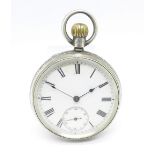 A silver Waltham pocketwatch
