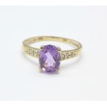 A 9ct gold, amethyst and diamond ring, 1.