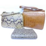A snake skin handbag with matching mirror,
