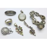 Two multi-stone pendants marked .925, a silver ring, a silver niello brooch, a .