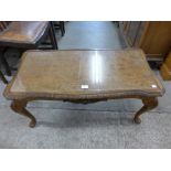 A burr walnut coffee table