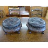 A pair of Victorian mahogany and leather circular footstools