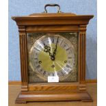 A Linden oak triple chime mantel clock