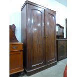 A Victorian mahogany two door wardrobe