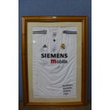 Three framed football shirts bearing signatures, England signed by David Beckham,