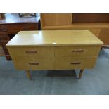 A small teak sideboard