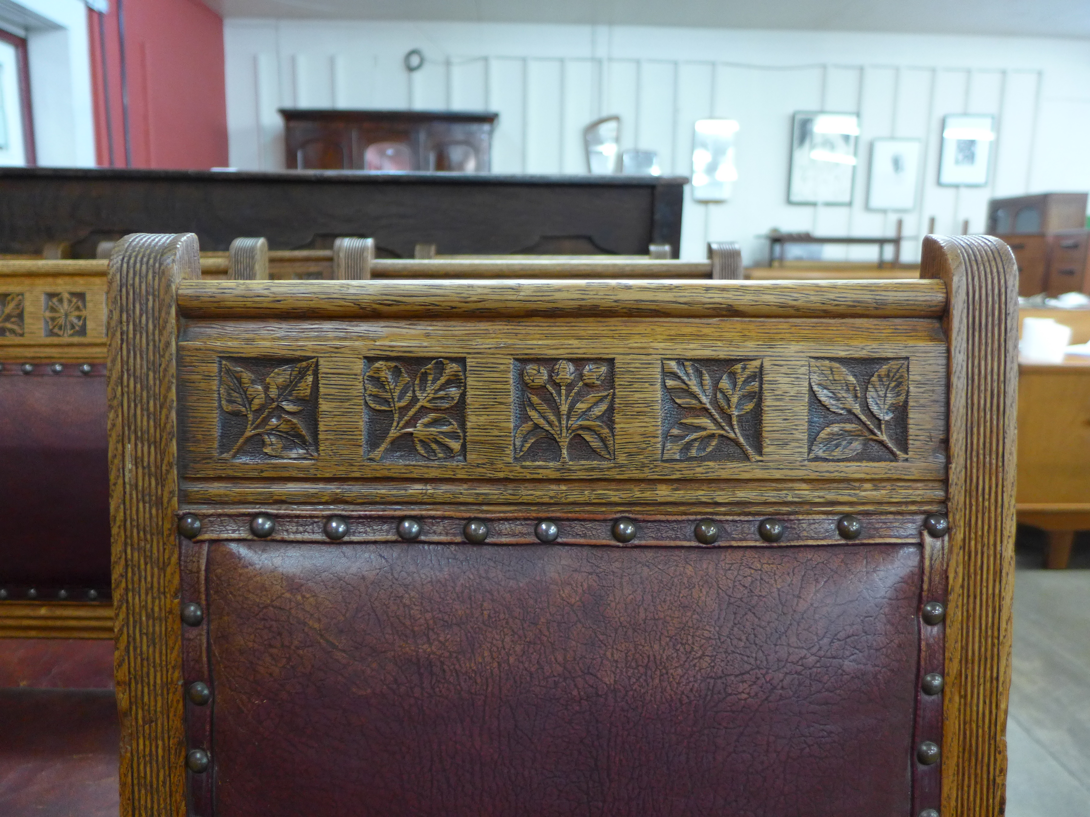 A set of ten Victorian oak and leather dining chairs, made by Plunknett & Steevens, - Image 3 of 7