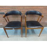 A pair of Danish BRDR Vejen teak and black vinyl chairs,