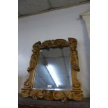 A 19th Century Baroque style giltwood mirror