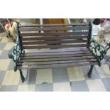 A cast iron ended garden bench