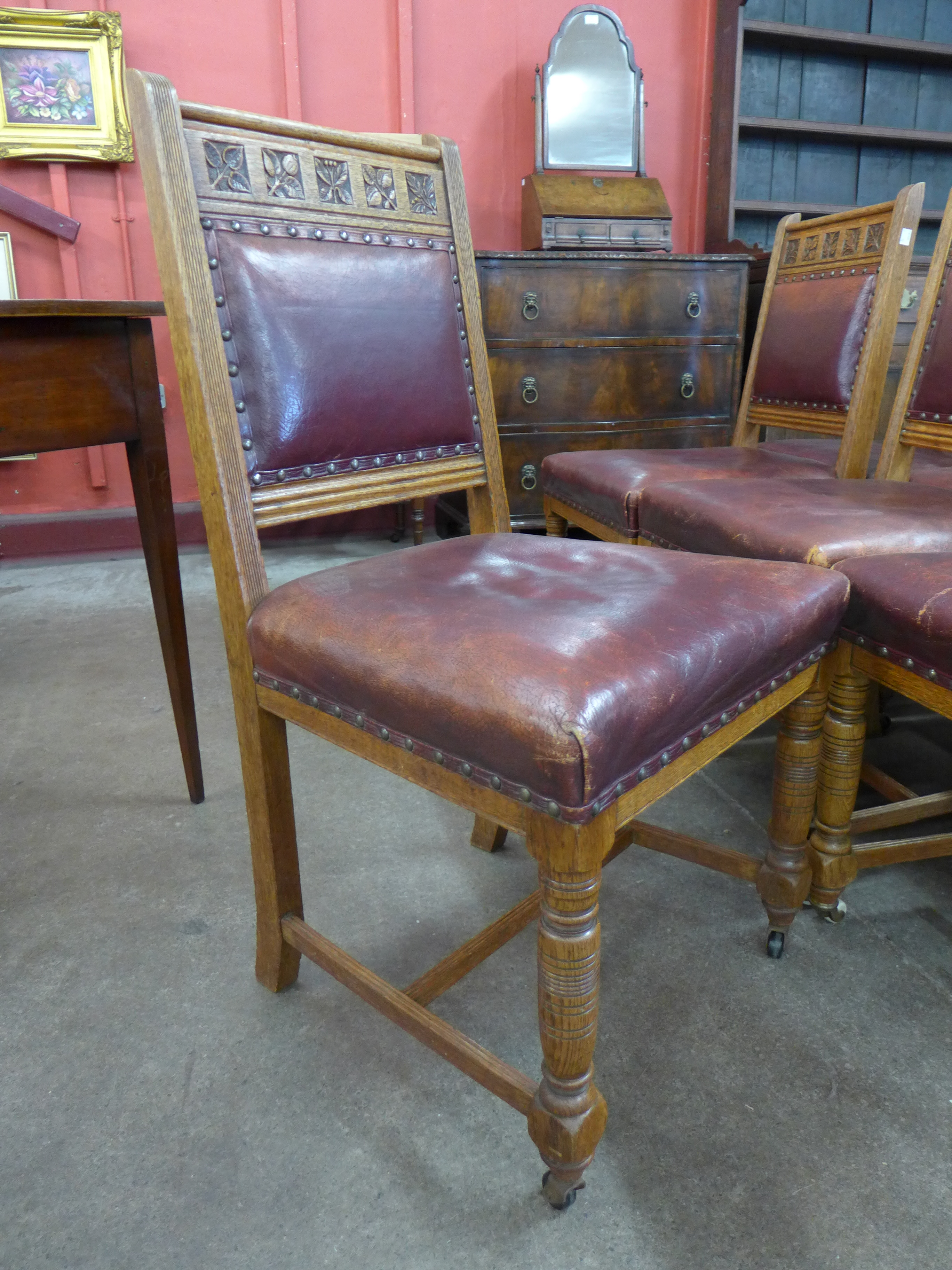 A set of ten Victorian oak and leather dining chairs, made by Plunknett & Steevens, - Image 2 of 7