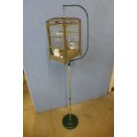 An Art Deco bird cage on stand