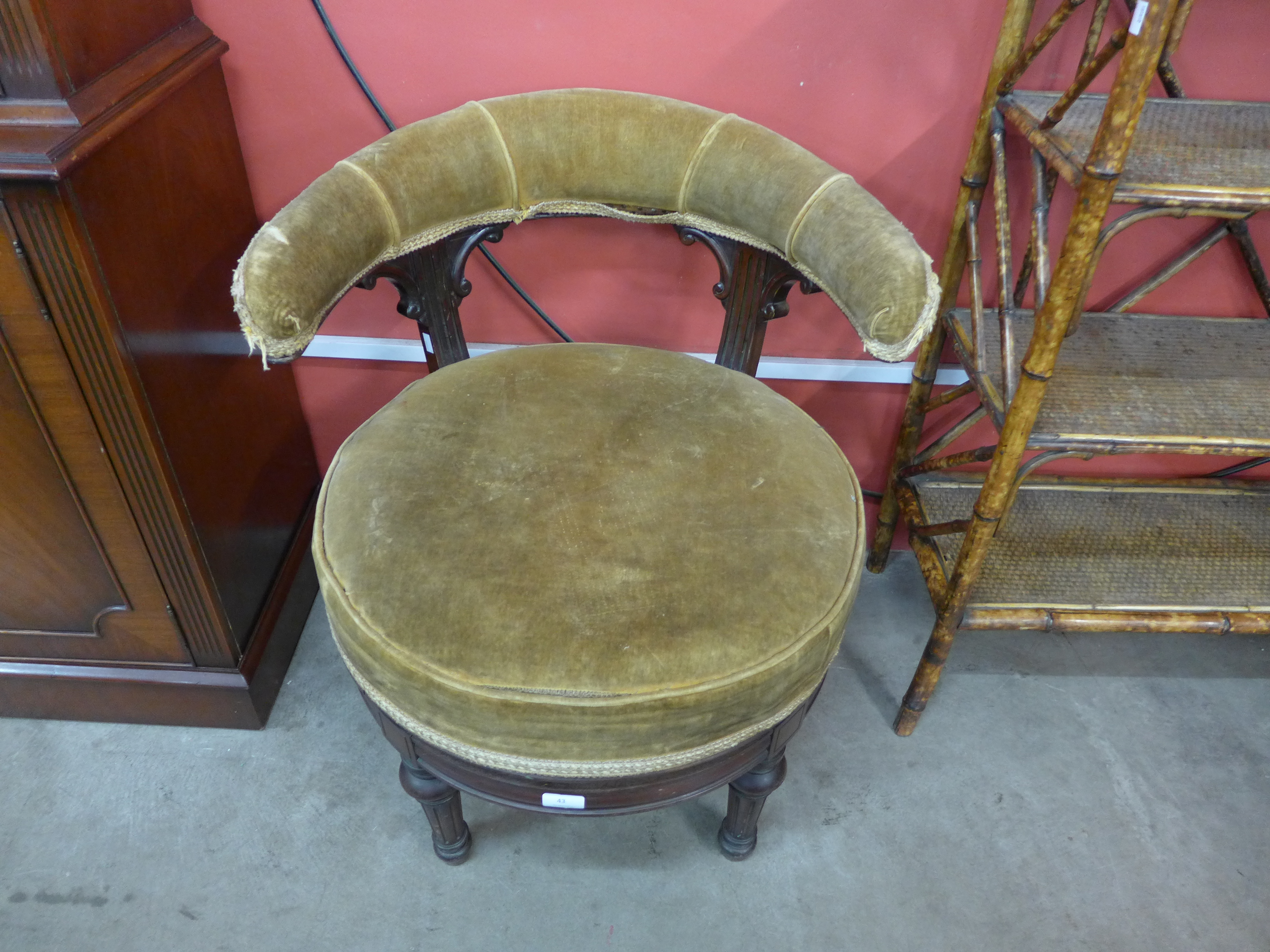 A Victorian mahogany and upholstered swivel tub chair