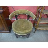 A Victorian mahogany and upholstered swivel tub chair