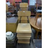 A set of ten stacking chairs