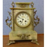 A 19th Century French onyx and gilt metal mantel clock