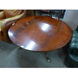 A Regency style mahogany circular coffee table