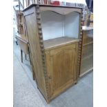 A French fruitwood single door cupboard