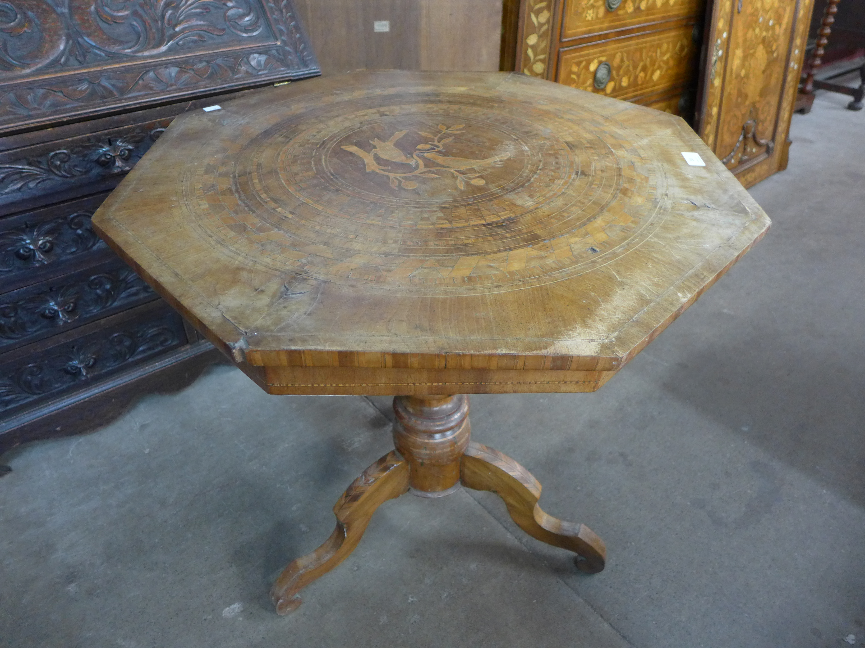 A 19th Century continental marquetry inlaid walnut tripod table