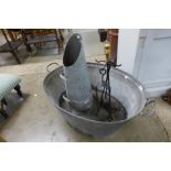 A galvanised wash tub,