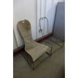 A pair of wrought steel rocking chairs