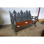 A miniature Coalbrookdale style garden bench