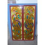 A set of four painted fairground panels